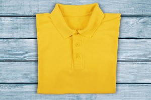 Yellow shirt on blue wood