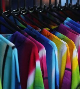 Tie-dyed t-shirts on rack