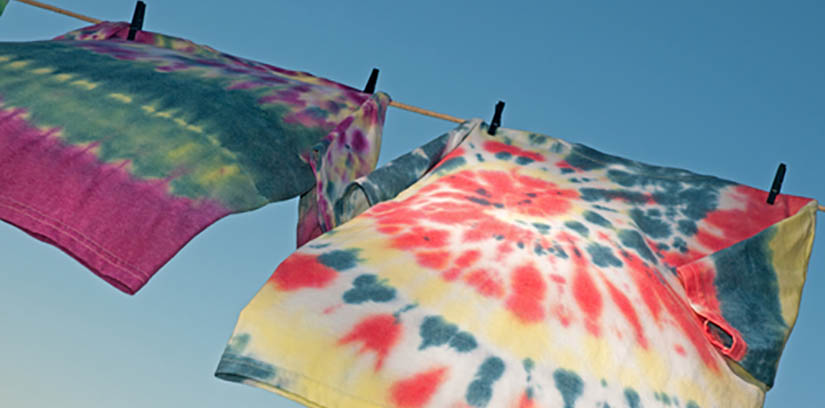 tie dye shirts drying in sun