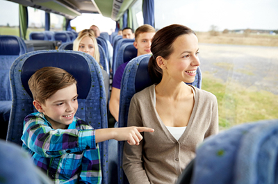 mother and son riding in bus