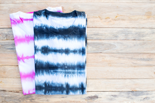 tie dye lightweight cotton shirts wooden background