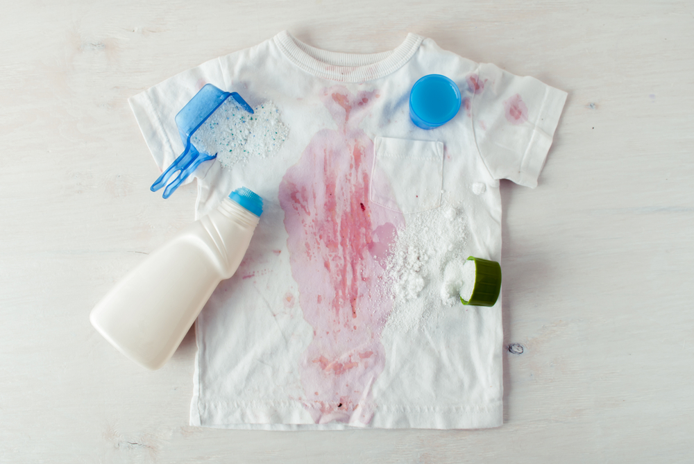 Dirty shirt with cleaning products