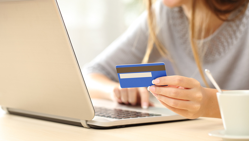 woman buying online laptop