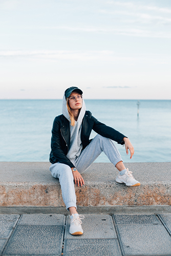 woman sweatpants boardwalk