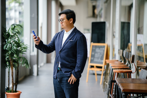 man in polo shirt and blazer