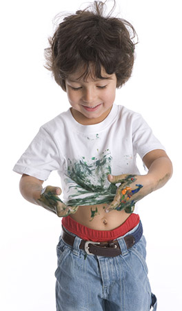 boy with paint stained shirt
