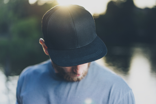 man wearing blank black hat