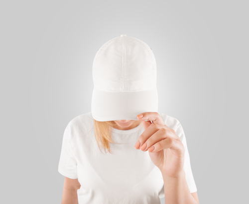 woman wearing plain baseball cap