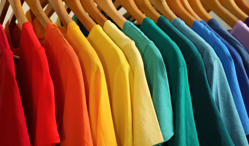 colorful t shirts on clothing rack