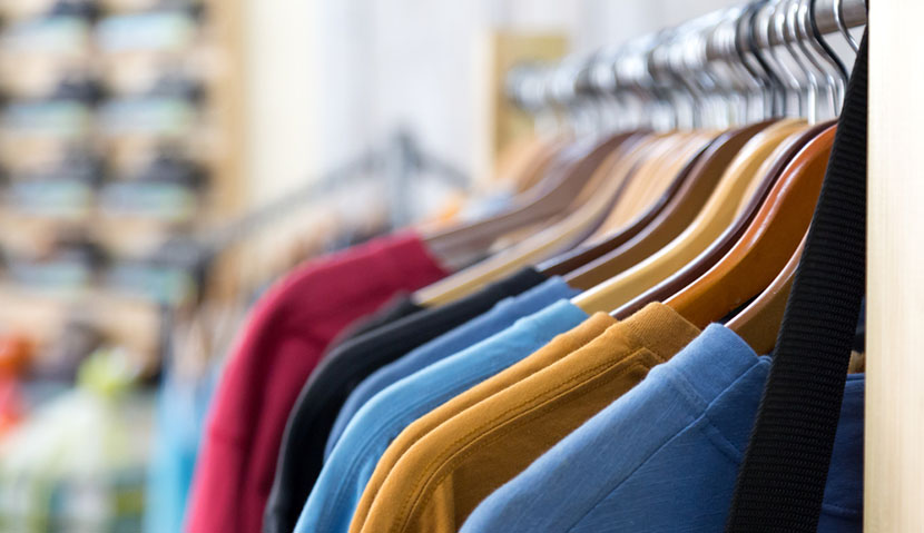 t shirts hanging on rack