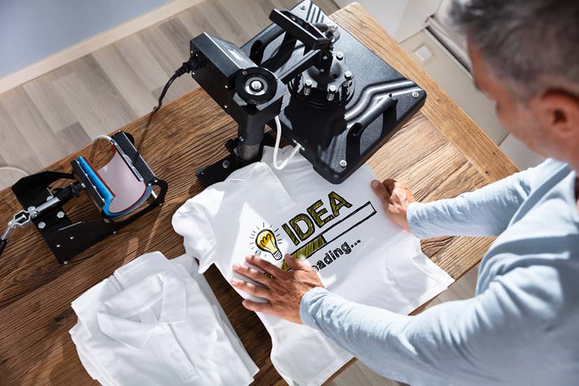 man printing white t shirt