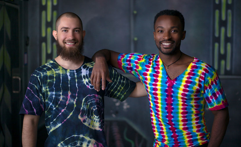 pair wearing reverse tie dyed shirts