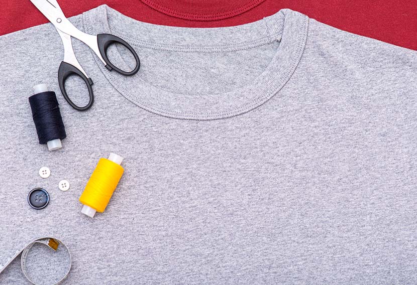 Sewing equipment on gray t-shirt