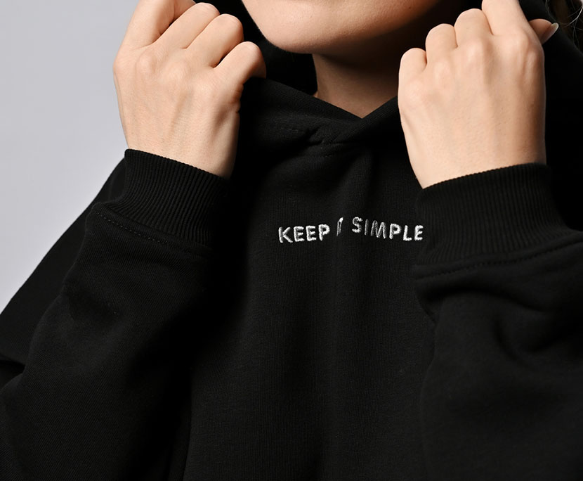 closeup slogan on black hoodie