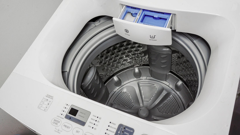 Detergent and softener compartment in top load washing machine