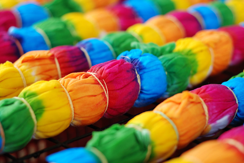 colorful tie dye cloth on rack